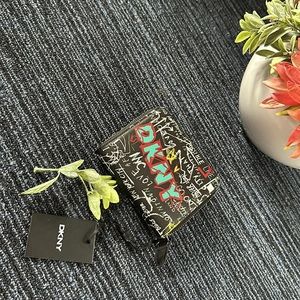 Dkny women’s zip-around black and blue wallet